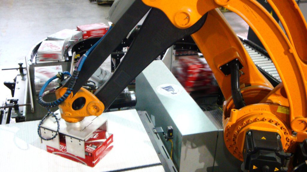 Orange colored robotic hand in motion