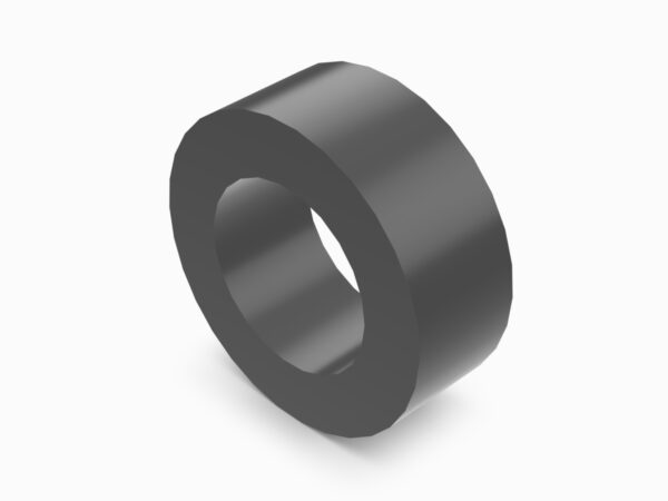 A black ring is sitting on top of a white table.