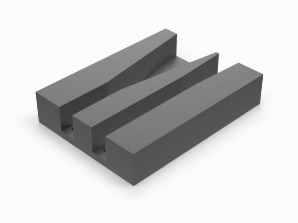 A gray block with three pieces of concrete