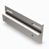 A metal piece of furniture with two holes for the handles.