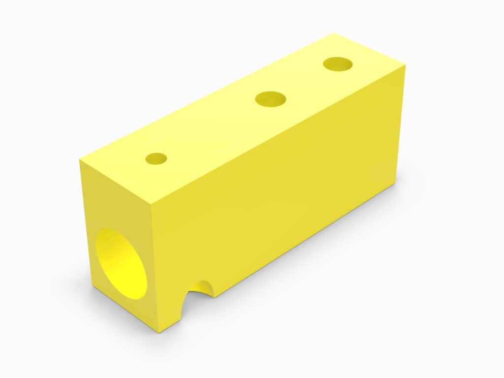 A yellow block with holes for the hole.