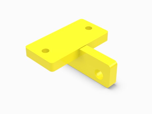 A yellow piece of plastic with two holes.