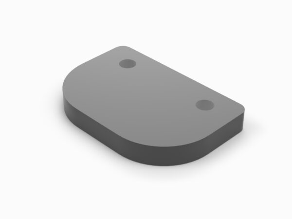 A gray object with two holes on top of it.