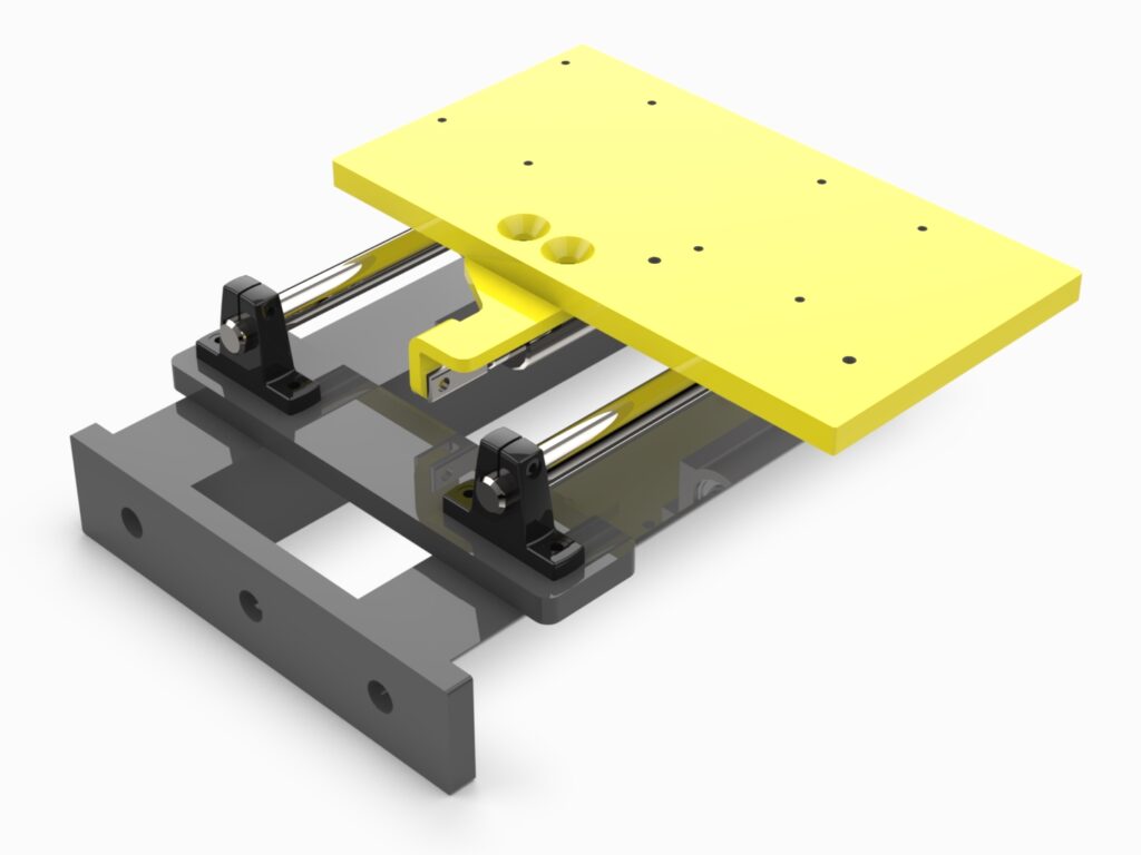 A yellow and black machine with two metal parts