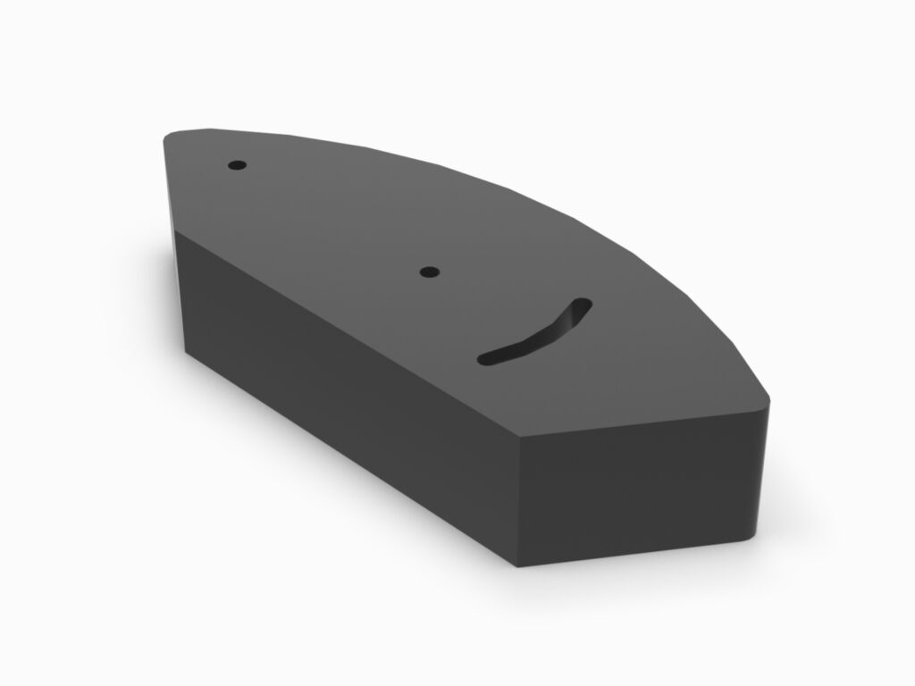 A black object with a smiley face on it.