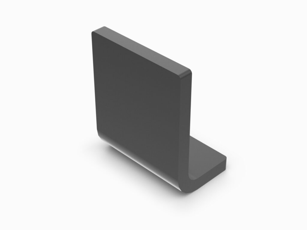 A black square shaped object on top of a white surface.