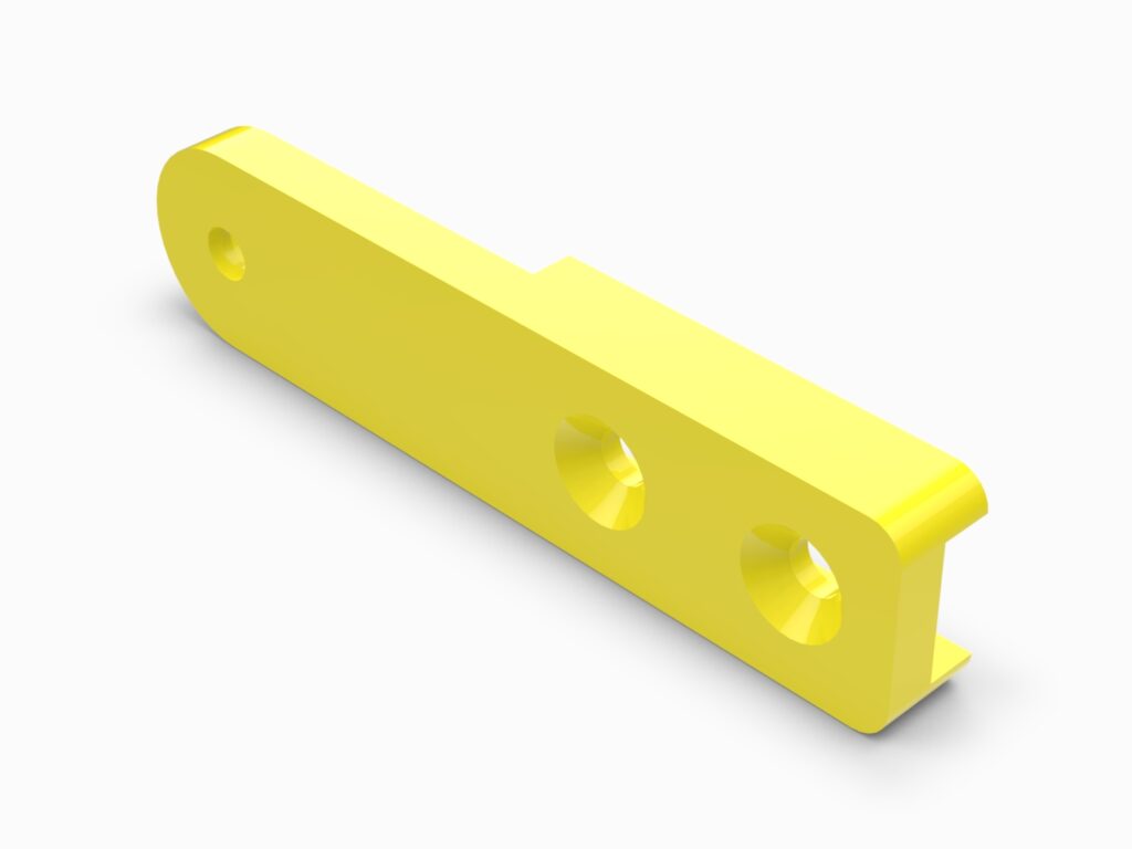 A yellow plastic object with holes in it.