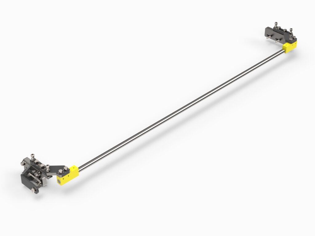 A metal rod with two yellow handles on it.