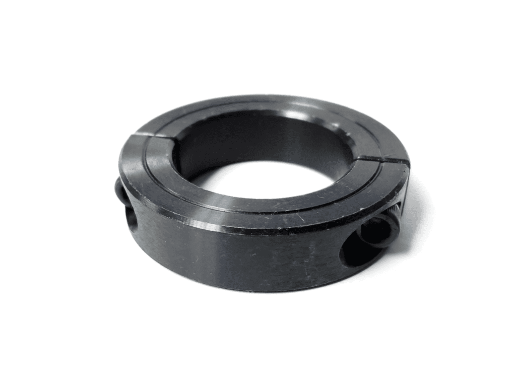 A black plastic ring with two holes on it.