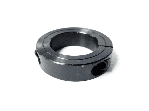 A black metal ring with two holes on it.