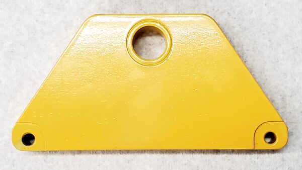 A yellow plastic object with a hole in it.