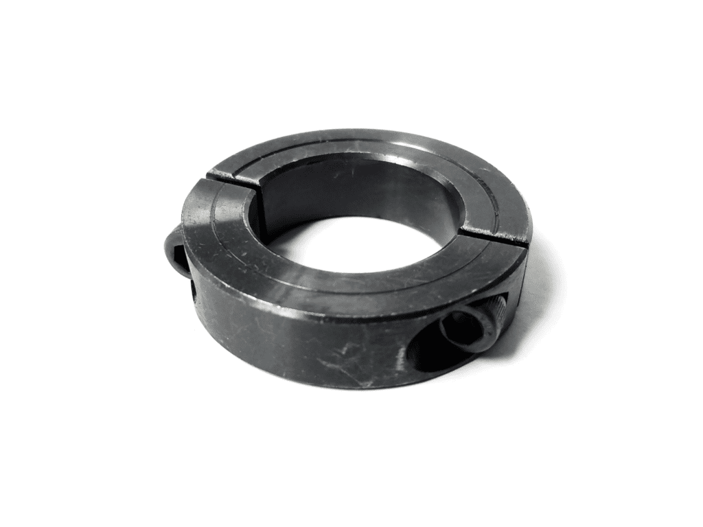 A black metal ring with two holes on it.