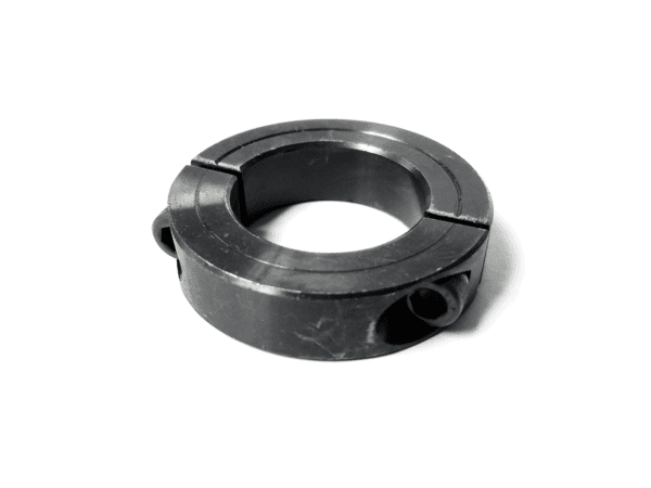 A black metal ring with two holes on it.