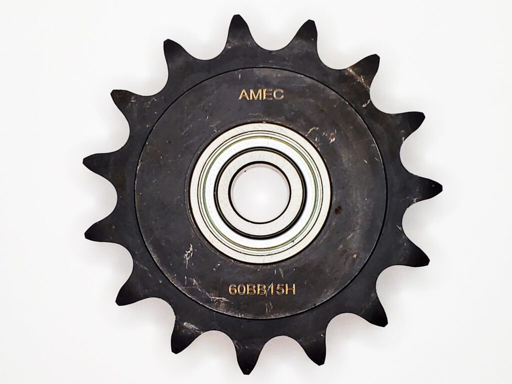 A black plastic wheel with a metal center ring.